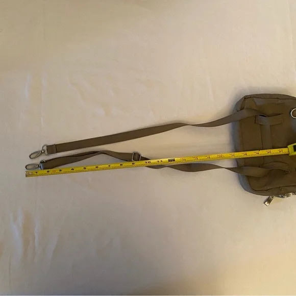 Baggallini Crossbody belt bag adjustable strap color is taupe RFDI - Picture 14 of 15